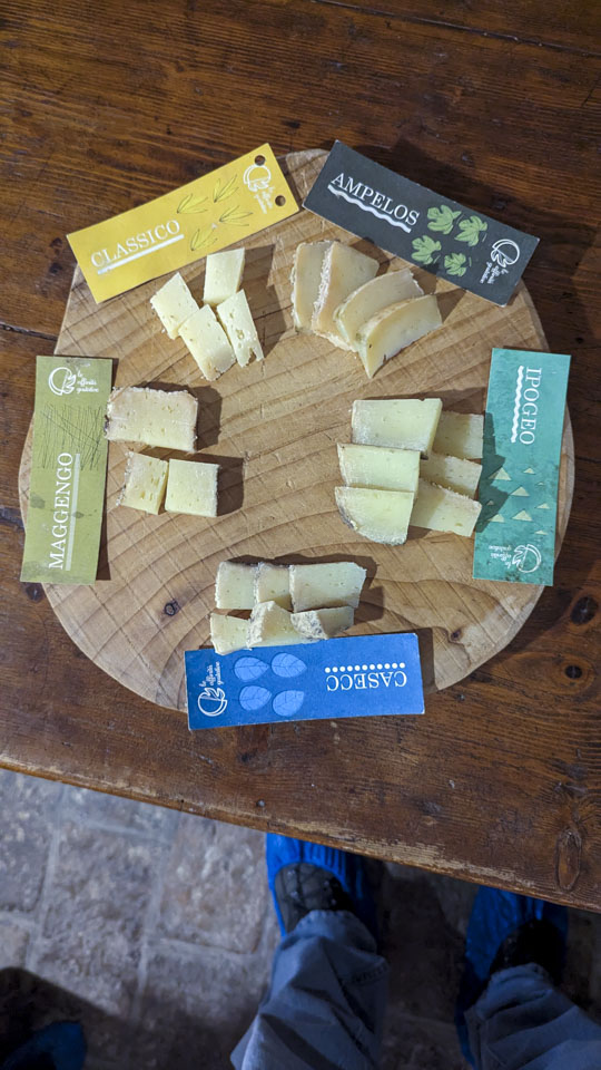 a plate of sliced cheeses to try