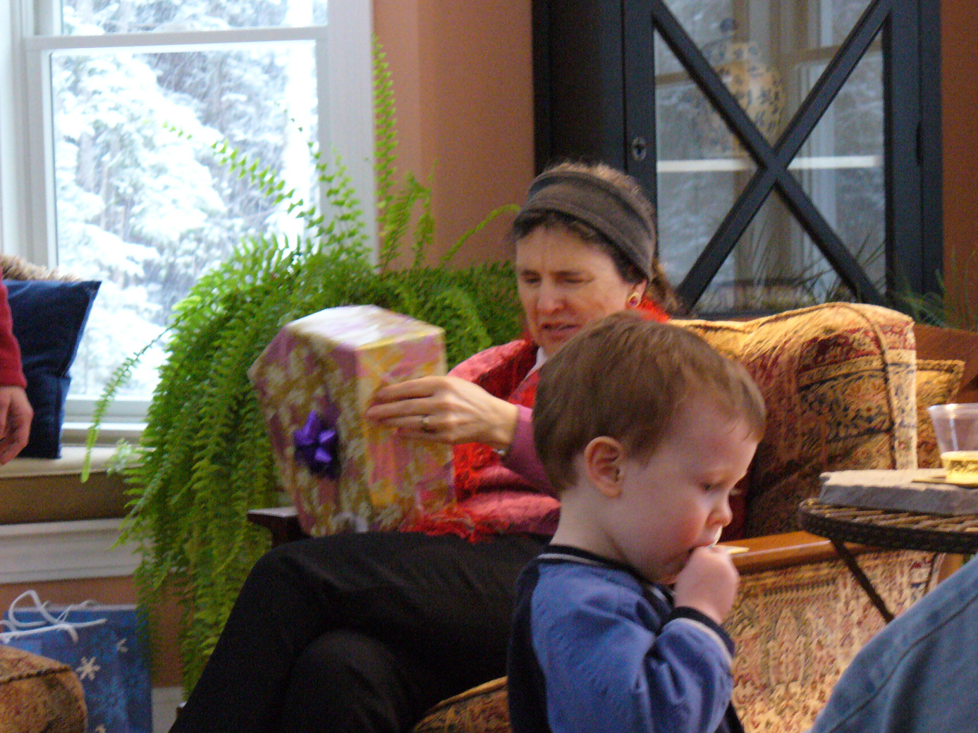 Mom opening gifts