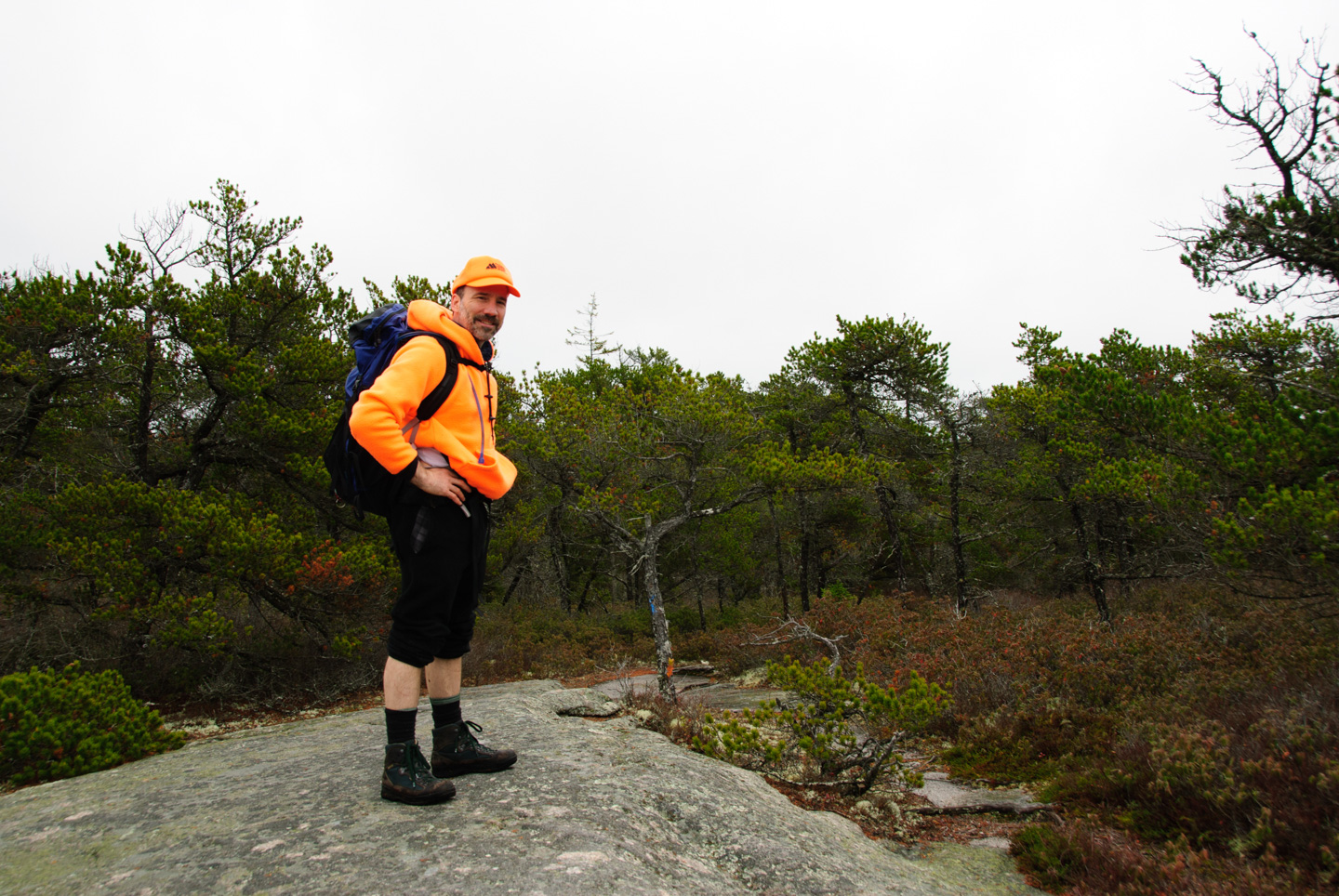 Paul wearing orange as protection