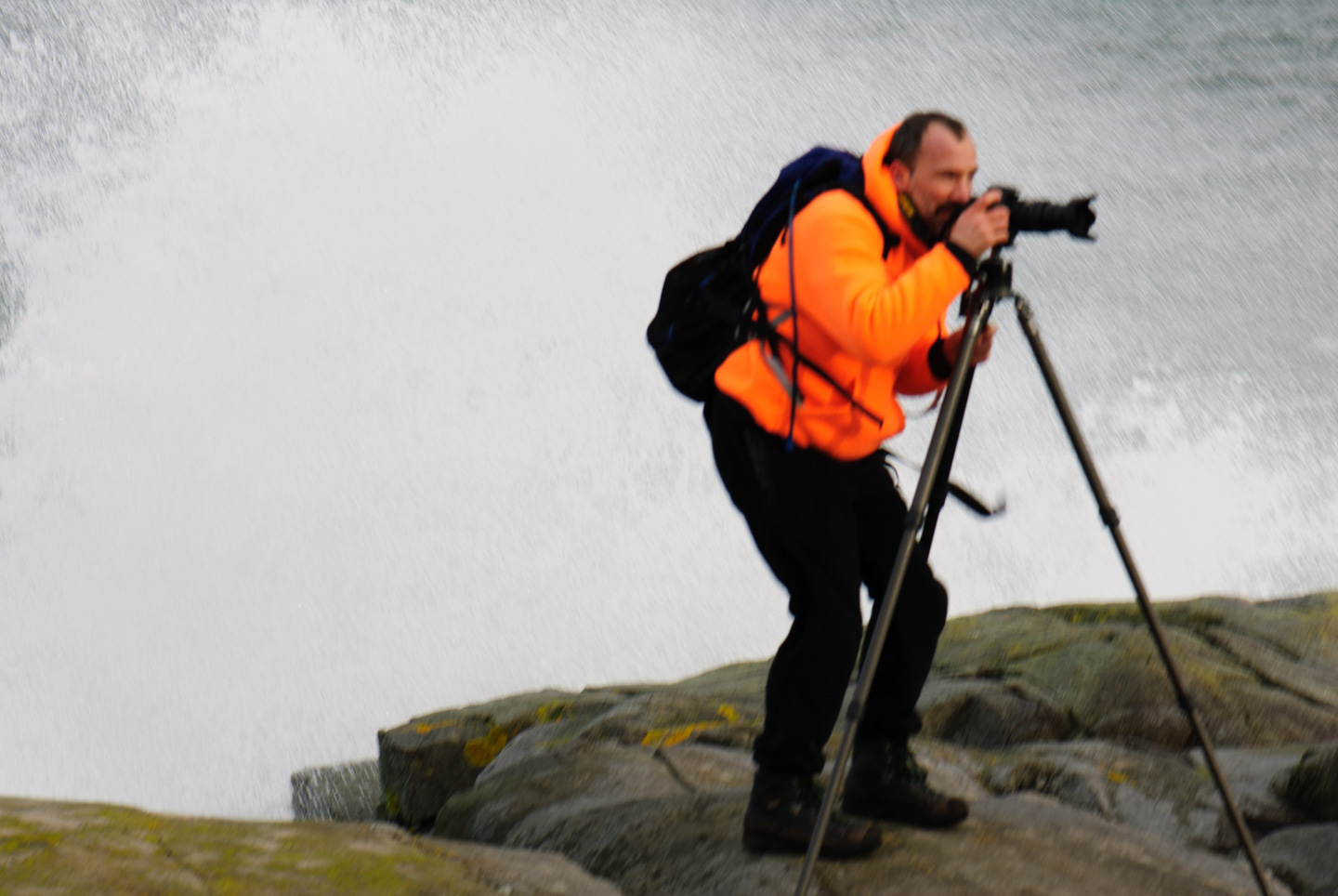 Paul getting splashed by some waves