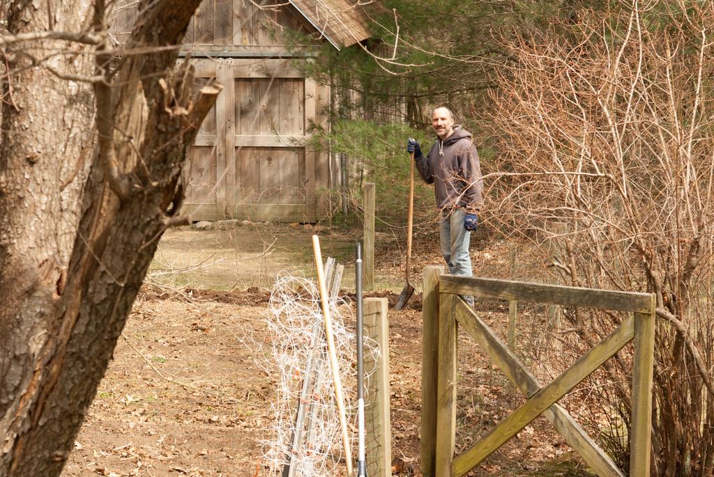 Paul turning over dirt