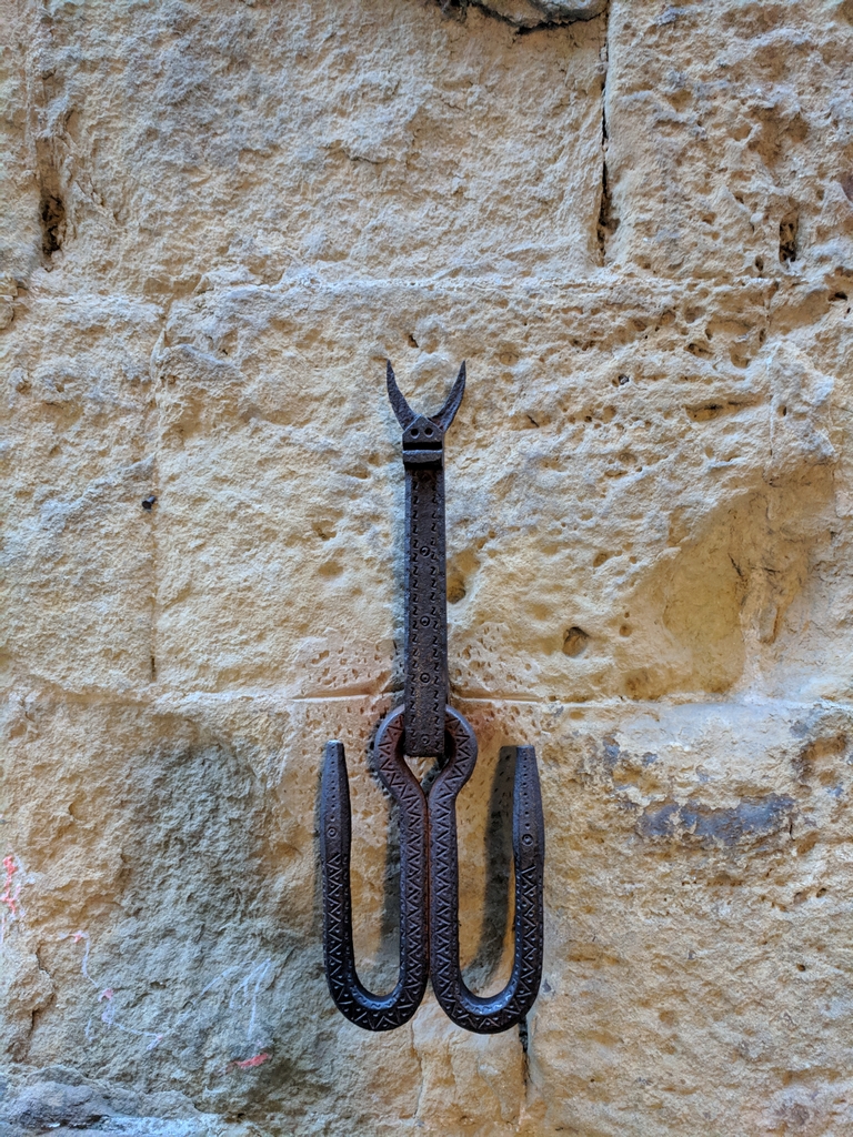 Iron hook on stone wall
