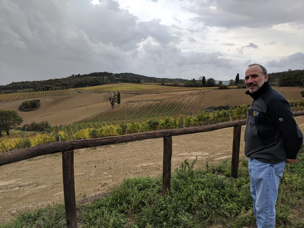Paul in front of the vineyard at Fattoria San Donatto