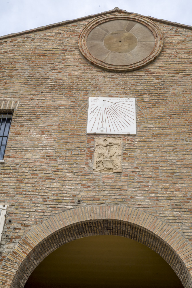 Sundial clock on the wall