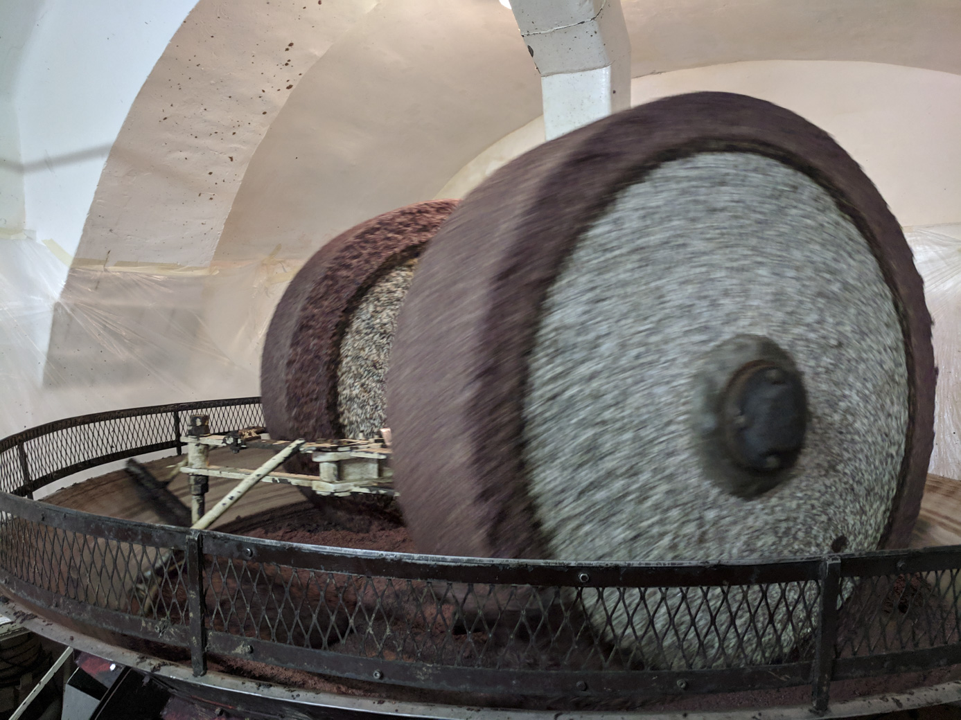 Stone wheels crushing olives