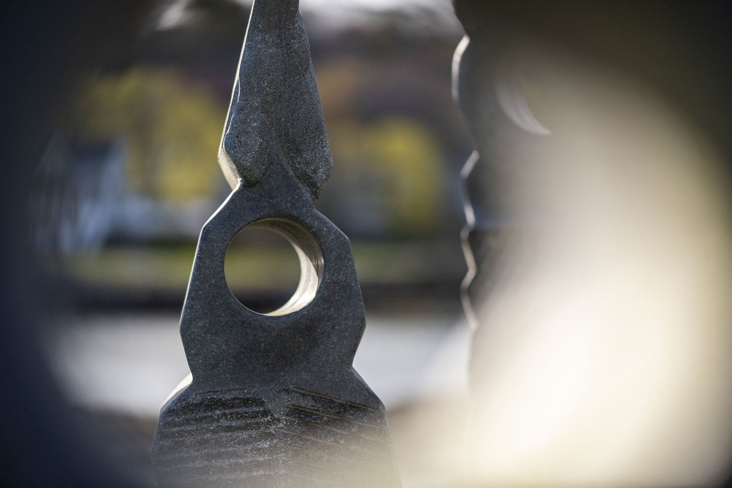sculpture seen through another sculpture, at an art gallery