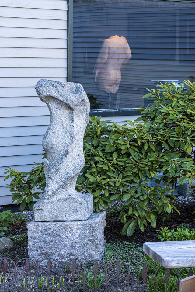 two sculptures of nudes