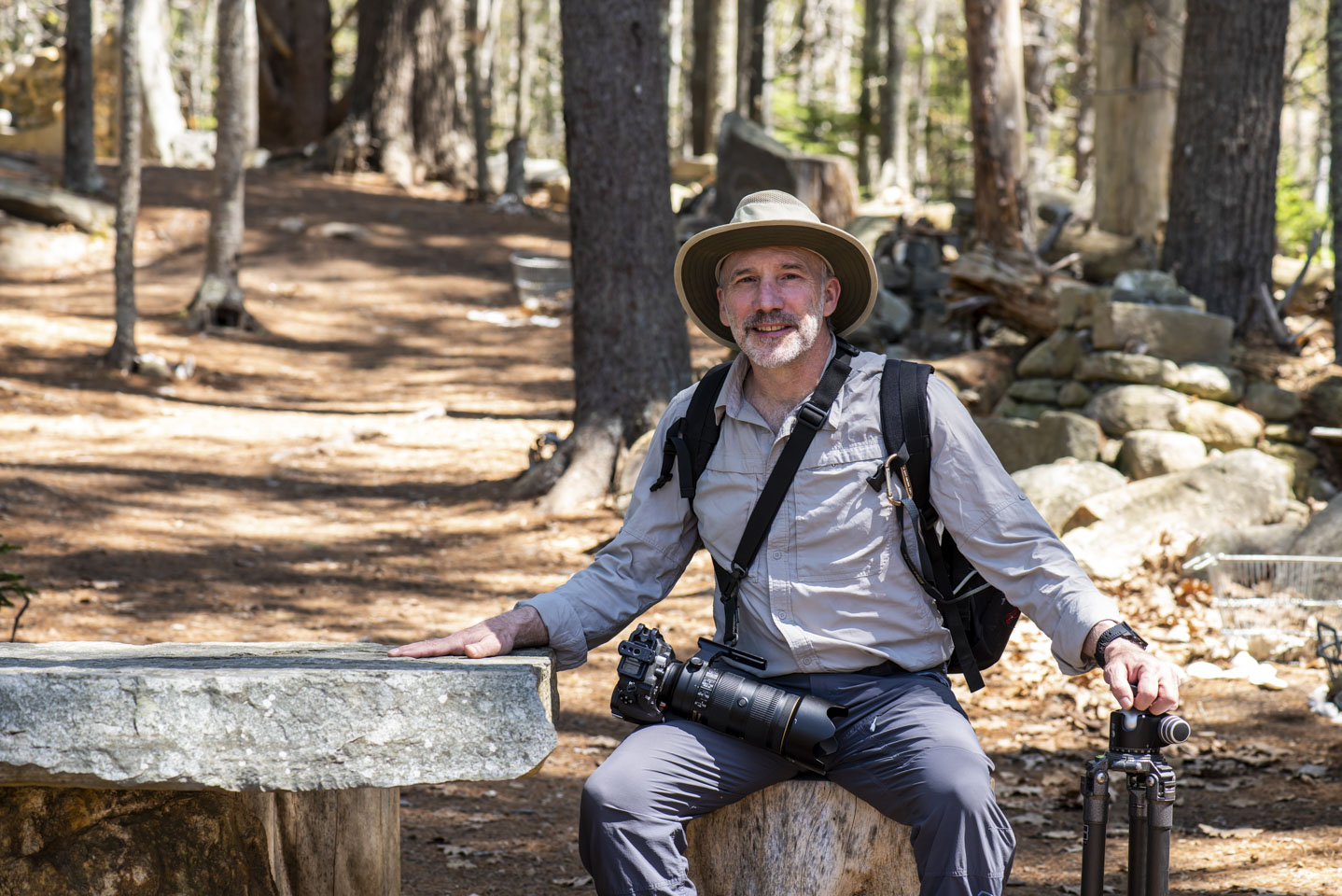 Paul sitting at the table in the fairy garden