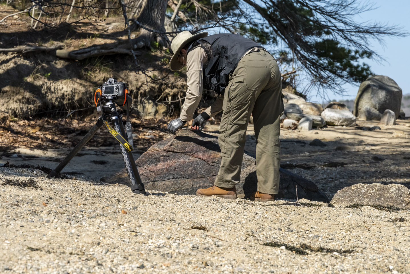 Anne setting the stone on a larger rock