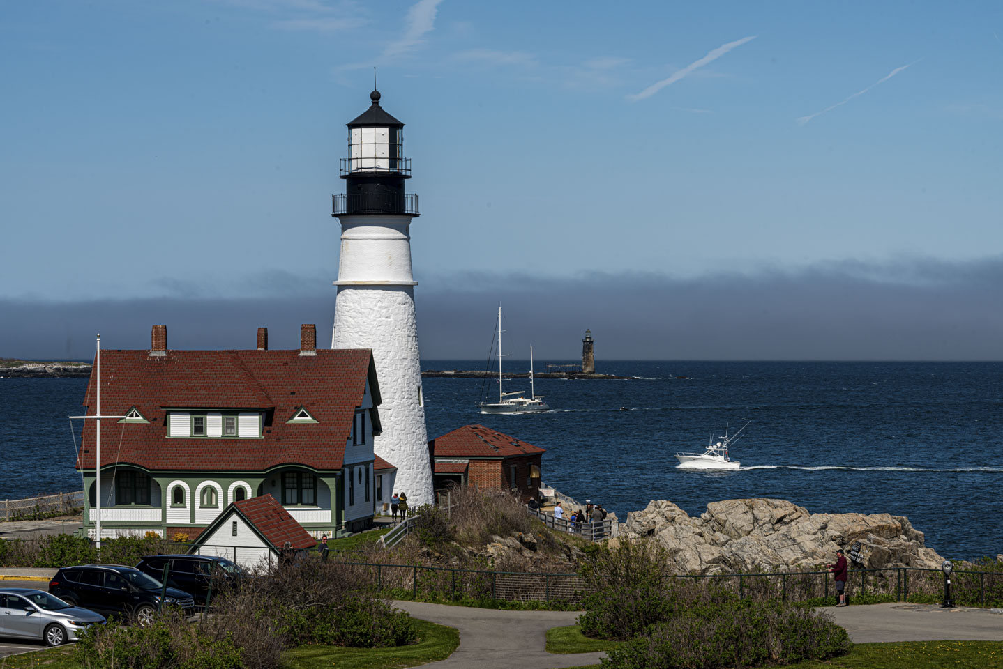 Portland Head Light with two boats coming into the channel