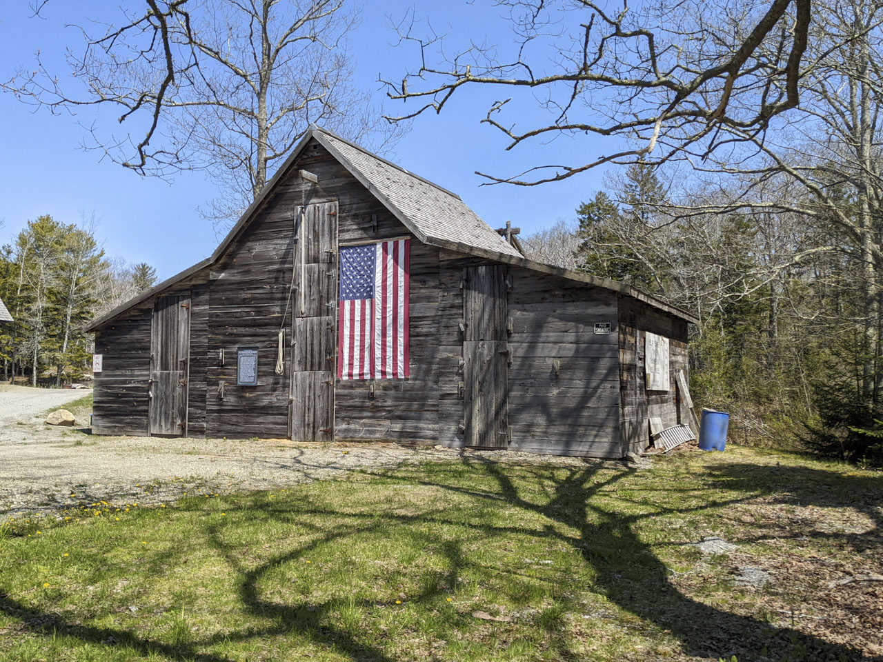 barn used to store ice; looks like a regular barn but has multi-layer doors.