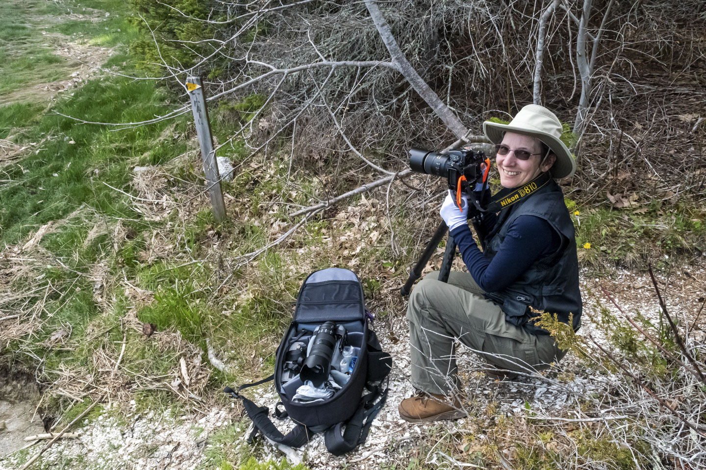 Anne with her camera on Glidden Midden and broken shells.