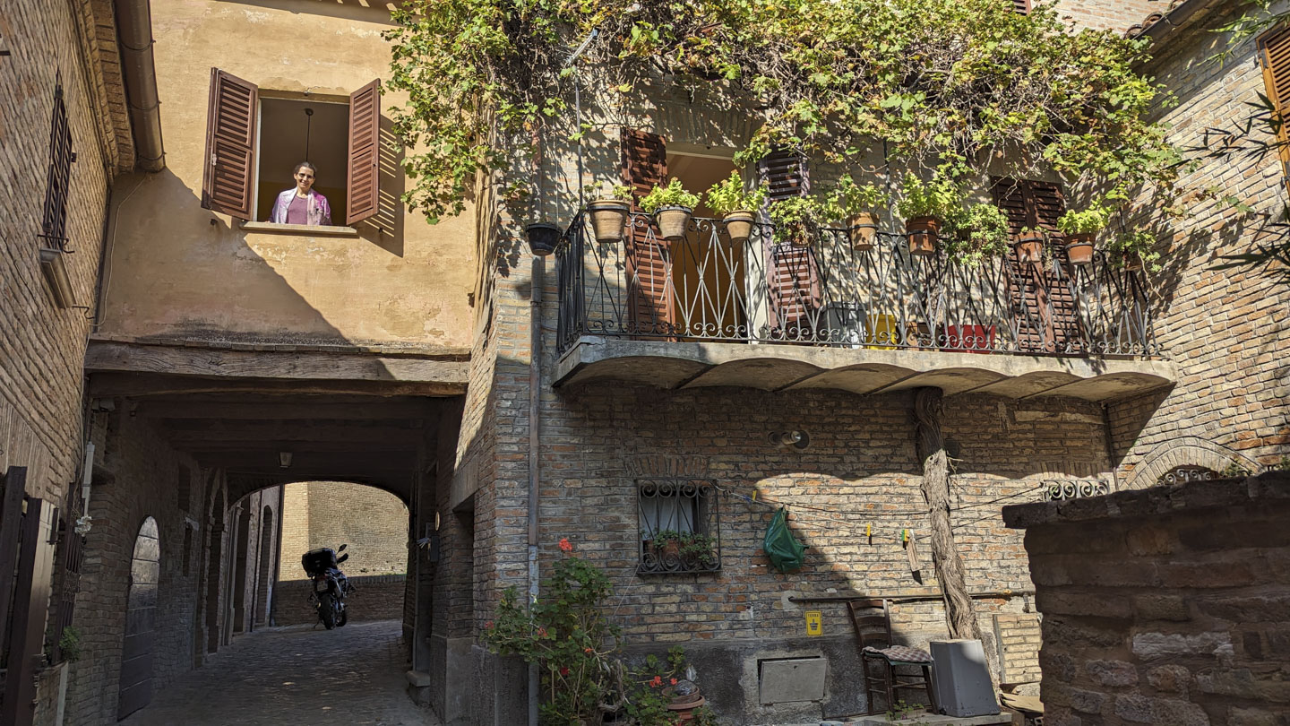 Anne in the window over the archway