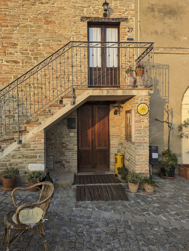 Entrance of Bar Giallo in Loretello, Marche, Italy