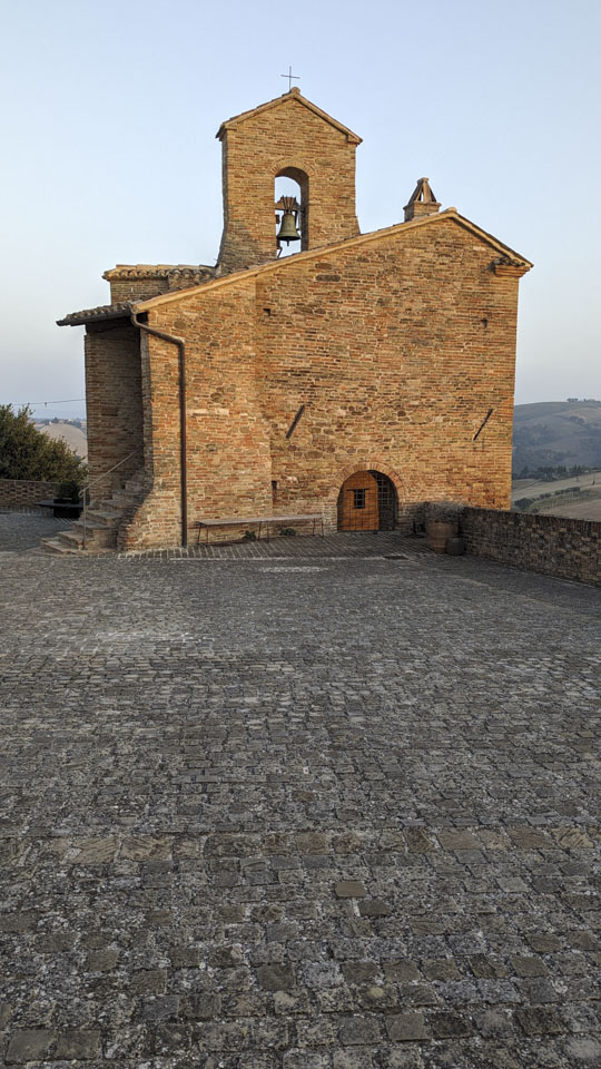 Building on the piazza in Loretello