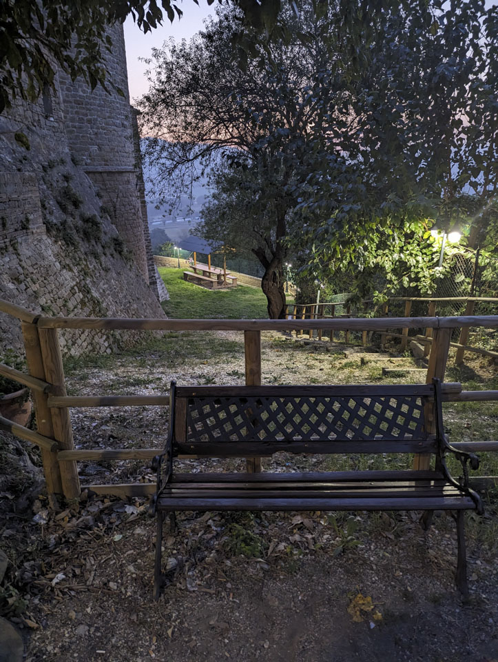 picnic table in the distance in a small park area