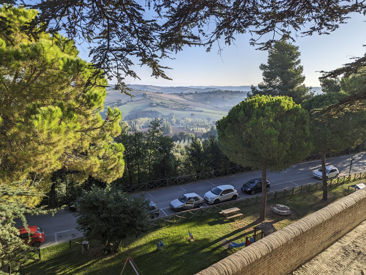 View of the countryside and a small playground in Mondavio