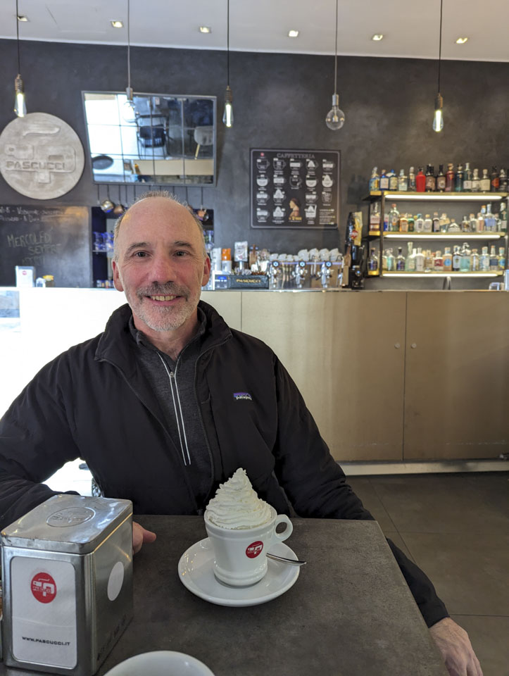 Paul at the bar in Mondavio, drinking hot chocolate