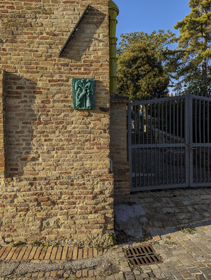 One of the Stations of the Cross that are on the exterior walls of buildings in Fratte Rosa