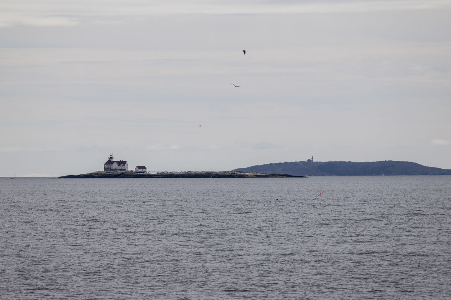 2 lighthouses. one closer and one much further away.