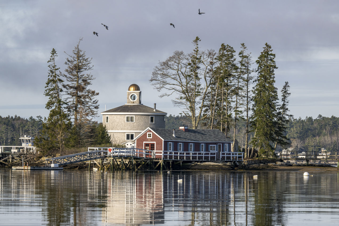 A closer picture that shows the round house and the long red house.