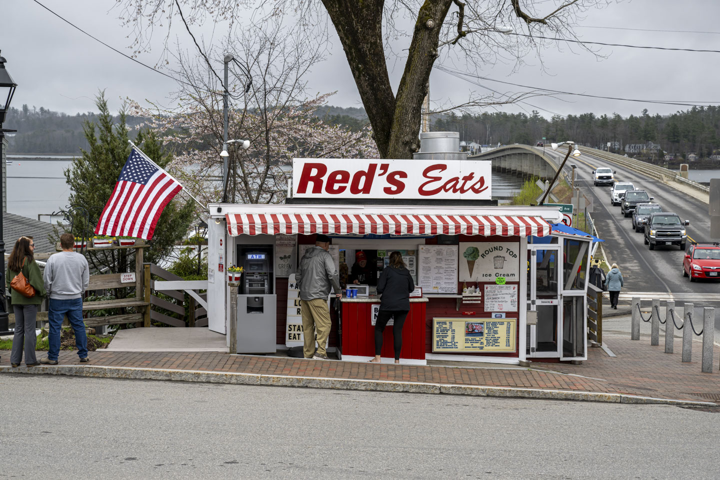 The restaurant stand Red's Eats has a couple of customers at the window.