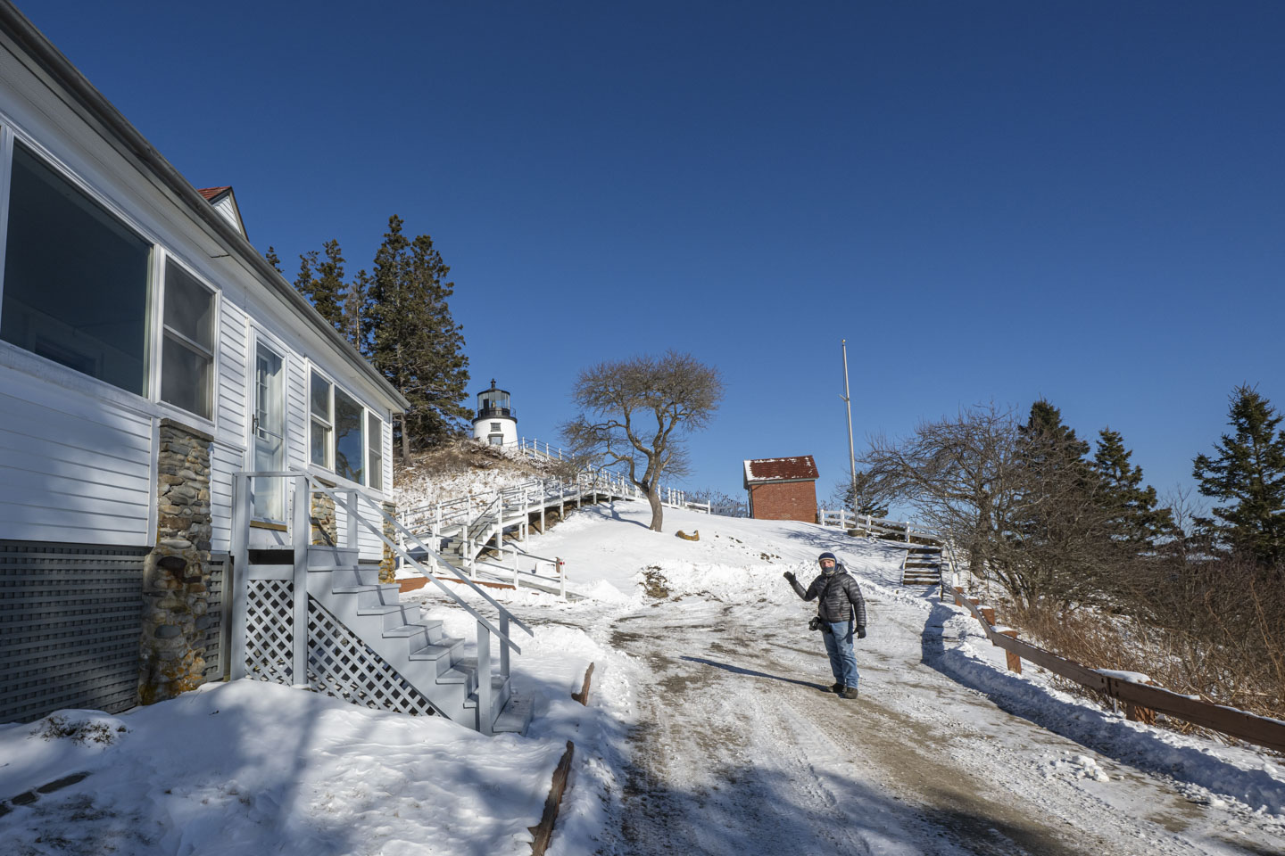 Paul is standing on the plowed road at Owls Head Lighthouse.