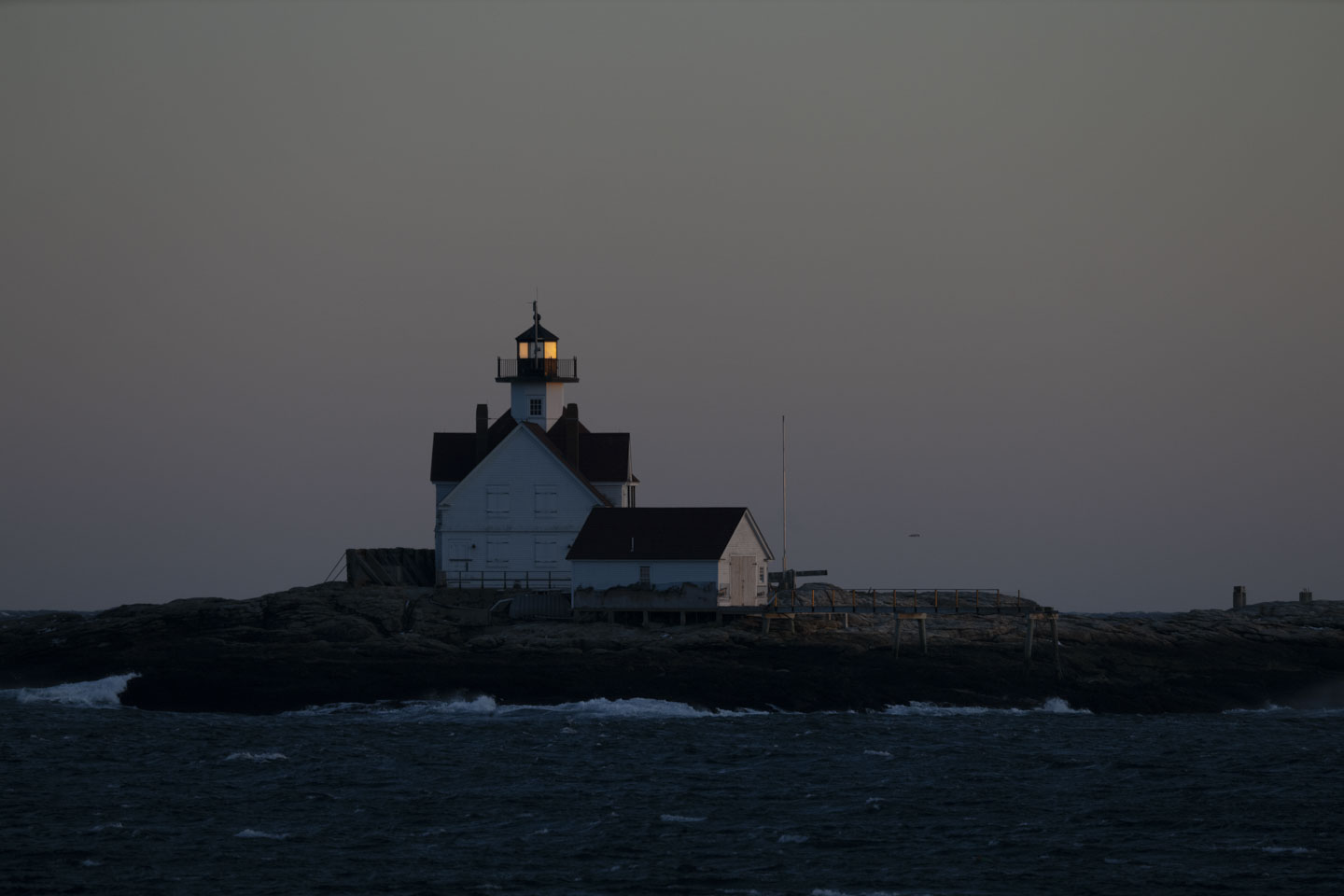 Cuckold Light has the setting sun shining on the glass.
