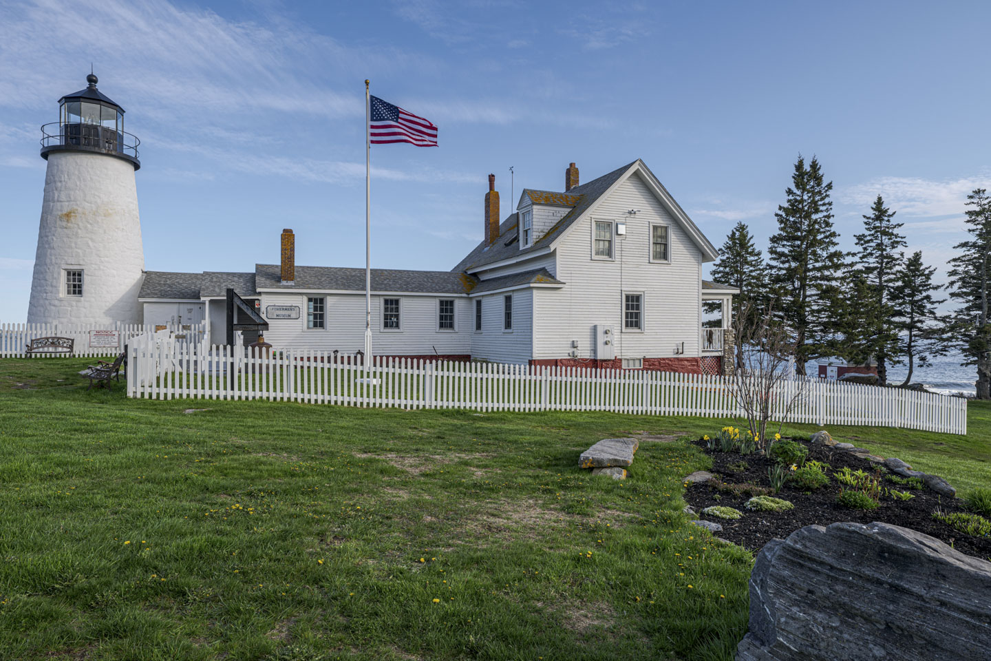 Pemaquid from front left, with the flag blowing in the breeze.