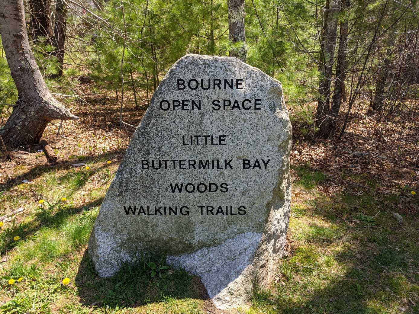 Engraved rock that serves as the sign for Little Buttermilk Bay Preserve