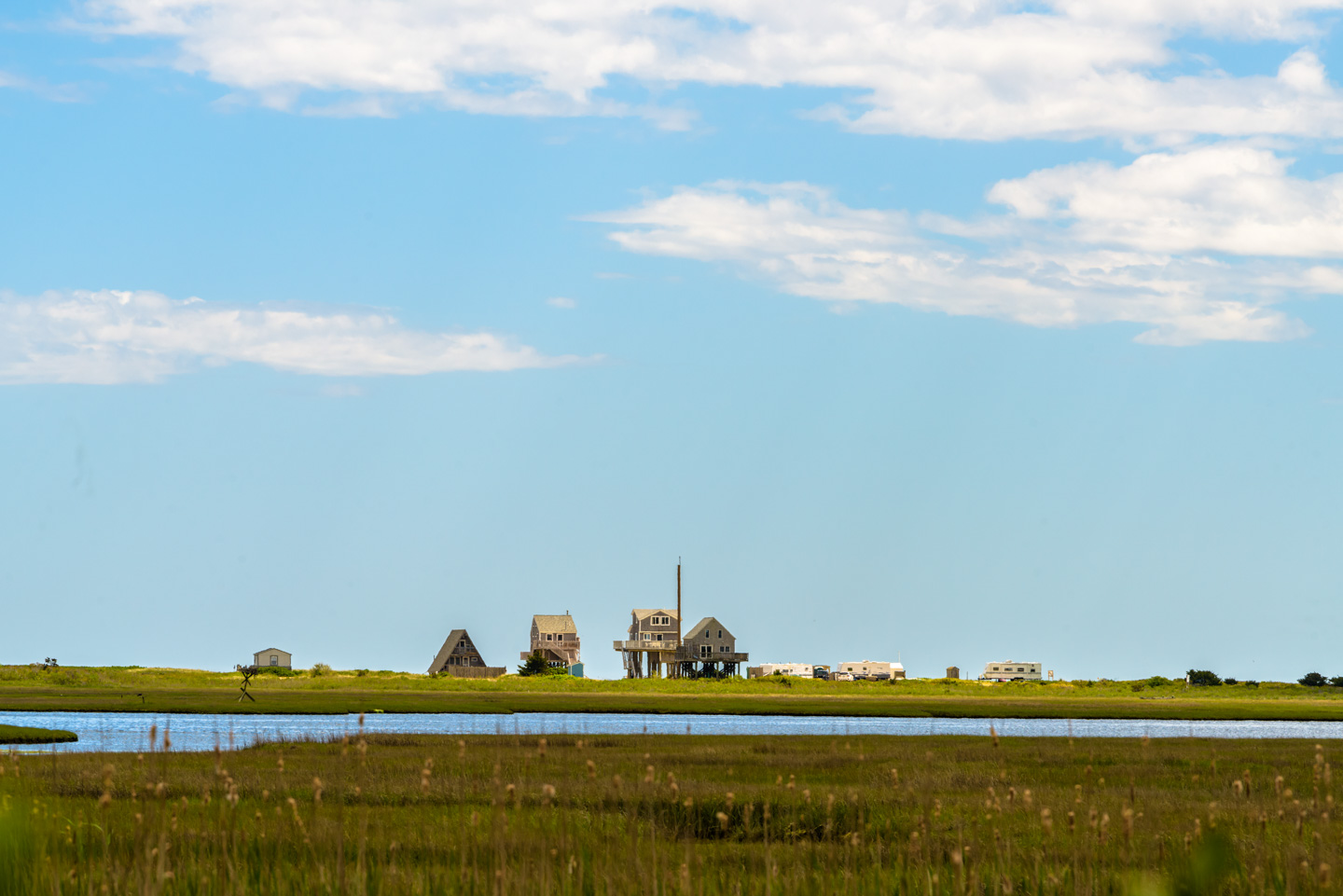 Houses on private land viewed through Allens Pond