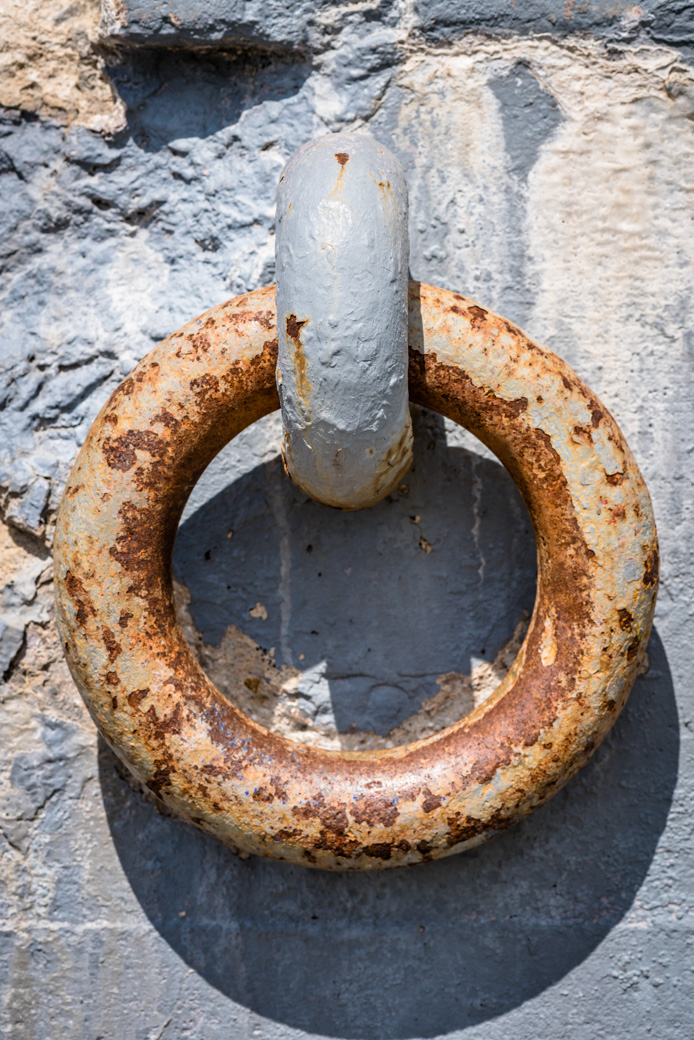 A metal ring once used to secure guns in the earthworks portion of Fort Taber