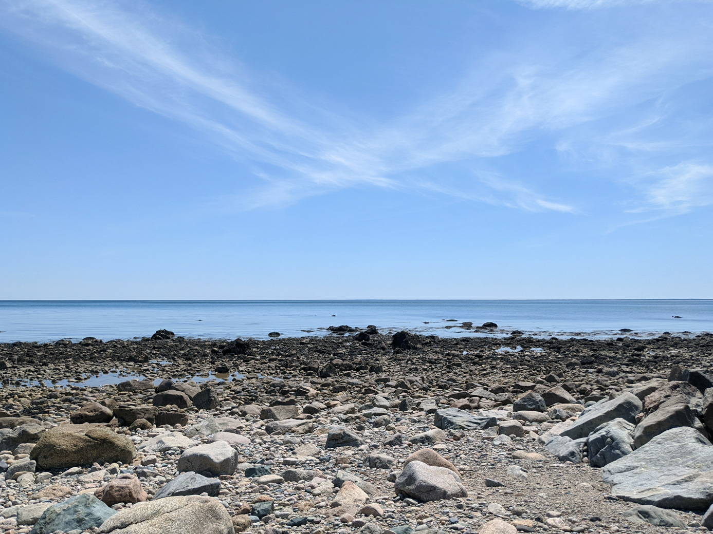 View of beach and water at Ellisville Harbor State Park